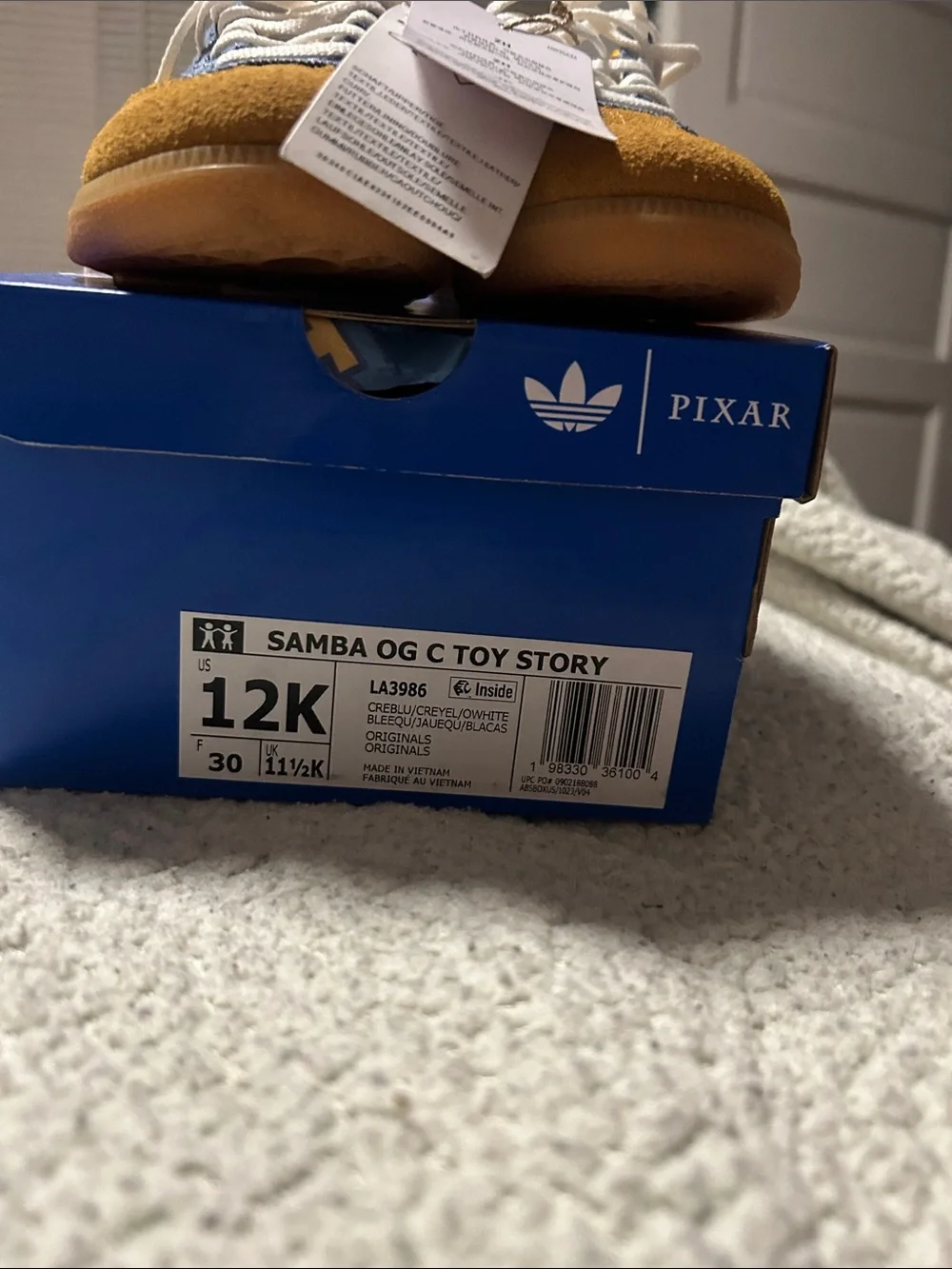 Kids Brown and Blue Toy Story 5 Adidas Sneakers with Yellow Accents